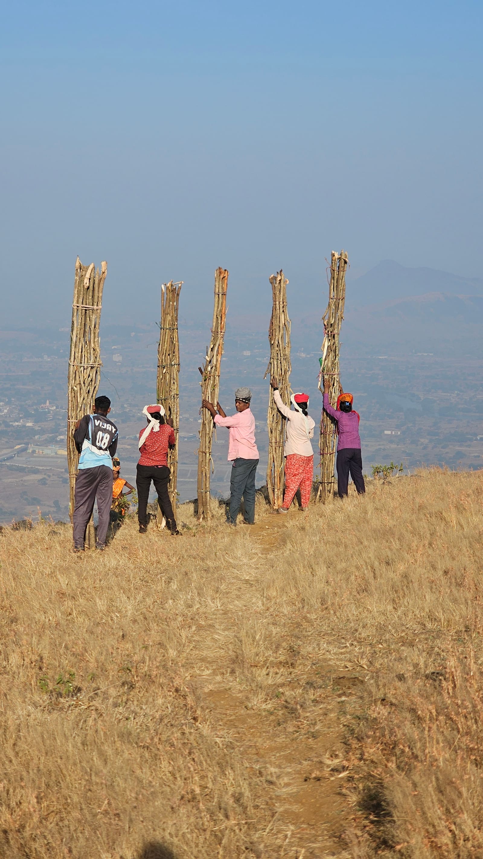 Locals carrying firewood at the padar of Mordhan Fort